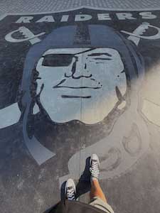 Chucks facing the Raider's logo