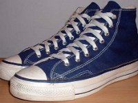 1970s Blue High Top Chucks  Angled side view of 1970s navy blue high tops.
