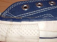 1970s Blue High Top Chucks  Close up of the outer stitching on the left side of a right 1970s navy blue high top.