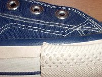 1970s Blue High Top Chucks  Close up of the outer stitching on the right side of a right 1970s navy blue high top.