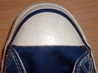 1970s Blue High Top Chucks  Close up of the right toe cap on a pair of 1970s navy blue high tops.