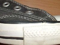 1980s Black High Top Chucks  Close up of the outer stitching on the right side of a left 1980s black high top.