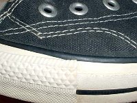 1980s Black High Top Chucks  Close up of the outer stitching on the left side of a 1980s left high top.