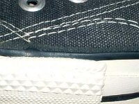 1980s Black High Top Chucks  Close up of the outer stitching on the left side of a right 1990s black high top.