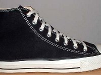 Early 1990s Black High Top Chucks  Outside view of a right early 1990s black high top.