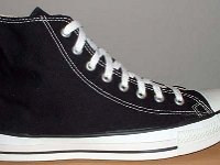 Late 1990s Black High Top Chucks  Outside view of a right late 1990s black high top.