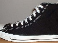 Late 1990s Black High Top Chucks  Outside view of a left late 1990s black high top.