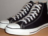 Late 1990s Black High Top Chucks  Angled side view of late 1990s black high tops.