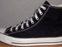2002 Made in Viet Name Black High Tops  Outside view of a left made in Viet Nam black high top.