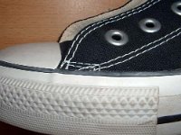 2002 Made in Viet Name Black High Tops  Close up of the outer stitching from the left side of a right made in Viet Nam black high top.
