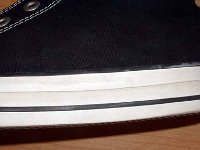 2002 Made in Viet Name Black High Tops  Close up of the outer wrap and piping from a made in Viet Nam black high top.