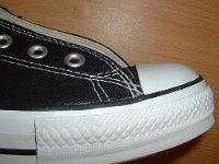 2005 Made in China Black High Top Chucks  Close up of the outer stitching on the right side of a right made in China black high top.