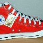 2-Tone Chucks  Red and black left 2-tone high top, new with tag, inside patch view.