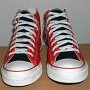2-Tone Chucks  Red and black 2-tone high tops, new with tag, front view.