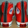 2-Tone Chucks  Red and black 2-tone high tops, new with tag, rear view.