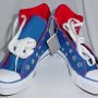 2-Tone Chucks  Brand new unlaced royal blue and red 2 tone high tops, front view.