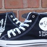 5 Seconds of Summer  Black and white pair of tribute chucks.