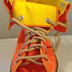 KH002 Orange/Yellow Made in USA KneeHi Chucks  Snapped down front view of the left orange and yellow kneehi chuck.