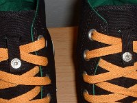 Black/Green/Amber Foldover High Top Chucks  Black, green, amber foldover, showing close up of lace snap.