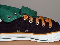 Black/Green/Amber Foldover High Top Chucks  Inside patch view of a left black, green, amber foldover rolled down to the sixth eyelet.