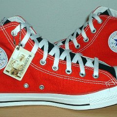 Red/Black 2-Tone High Top Chucks  Red and black 2-tone high tops, new with tag, inside patch view.
