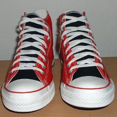 Red/Black 2-Tone High Top Chucks  Red and black 2-tone high tops, new with tag, front view.