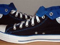 Black and Royal Roll Down High Top Chucks  Inside patch views of the black and royal blue high tops rolled down to the seventh eyelet.