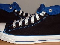 Black and Royal Roll Down High Top Chucks  Outside views of the black and royal blue high tops rolled down to the seventh eyelet.