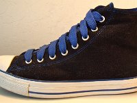 Black and Royal Roll Down High Top Chucks  Left outside view of the black and royal blue high tops with fat royal shoelaces.