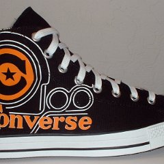 Black/White/Orange Converse Century Print High Top Chucks  Outside view of a right black, white, and orange century print high top.