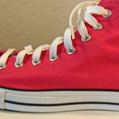 Raspberry High Top Chucks  Outside view of the raspberry left high top.