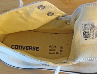 buffwhitehi9  Insole closeup view of a buff white high top.