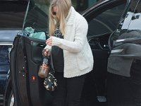 Amanda Seyfried  Getting out of her car.
