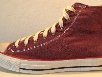Washed Andorra Red High Top Chucks  Outside view of a left washed Andorra red high top.