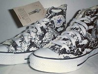 Chucks With Animal Print Uppers  Brand new snakeskin pattern high tops, angled side view.