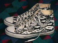 Chucks With Animal Print Uppers  Snakeskin pattern high tops, outside view.
