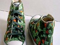 Chucks With Animal Print Uppers  Conosaur (dinosaur) pattern high tops, front and rear views.