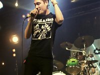 Bastille  Dan Smith singing in concert.