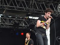 Bastille  Dan Smith at the edge of the stage.