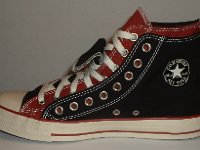 Black and Brick Red Double Upper High Top Chucks  Inside patch view of a right black and brick red double upper high top.