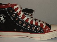 Black and Brick Red Double Upper High Top Chucks  Inside patch view of a left black and brick red double upper high top.