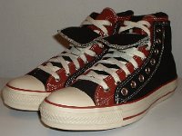 Black and Brick Red Double Upper High Top Chucks  Angled side view of black and brick red double upper high tops.