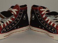 Black and Brick Red Double Upper High Top Chucks  Angled front view of black and brick red double upper high tops.
