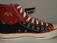 Black and Brick Red Double Upper High Top Chucks  Inside patch view of a folded down left black and brick red double upper high top.