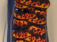 Black Flames Shoelaces for Chucks  Black flames print shoelace on a navy blue high top.