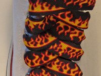 Black Flames Shoelaces for Chucks  Black flames print shoelace on an optical white high top.