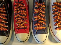Black Flames Shoelaces for Chucks  Black flames print shoelaces on core color high tops.