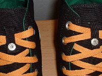 Black, Green, and Amber Foldover High Top Chucks  Black, green, amber foldover, showing close up of lace snap.