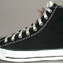 New Black High Top Chucks  Brand new laced left black high top, outside view.