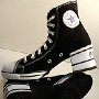 New Black High Top Chucks  High heeled black high tops, inside patch and sole views.